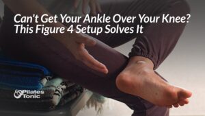 Person demonstrating Figure 4 hip stretch position with ankle crossed over knee. Text overlay reads: Can't Get Your Ankle Over Your Knee? This Figure 4 Setup Solves It. Pilates Tonic logo visible.