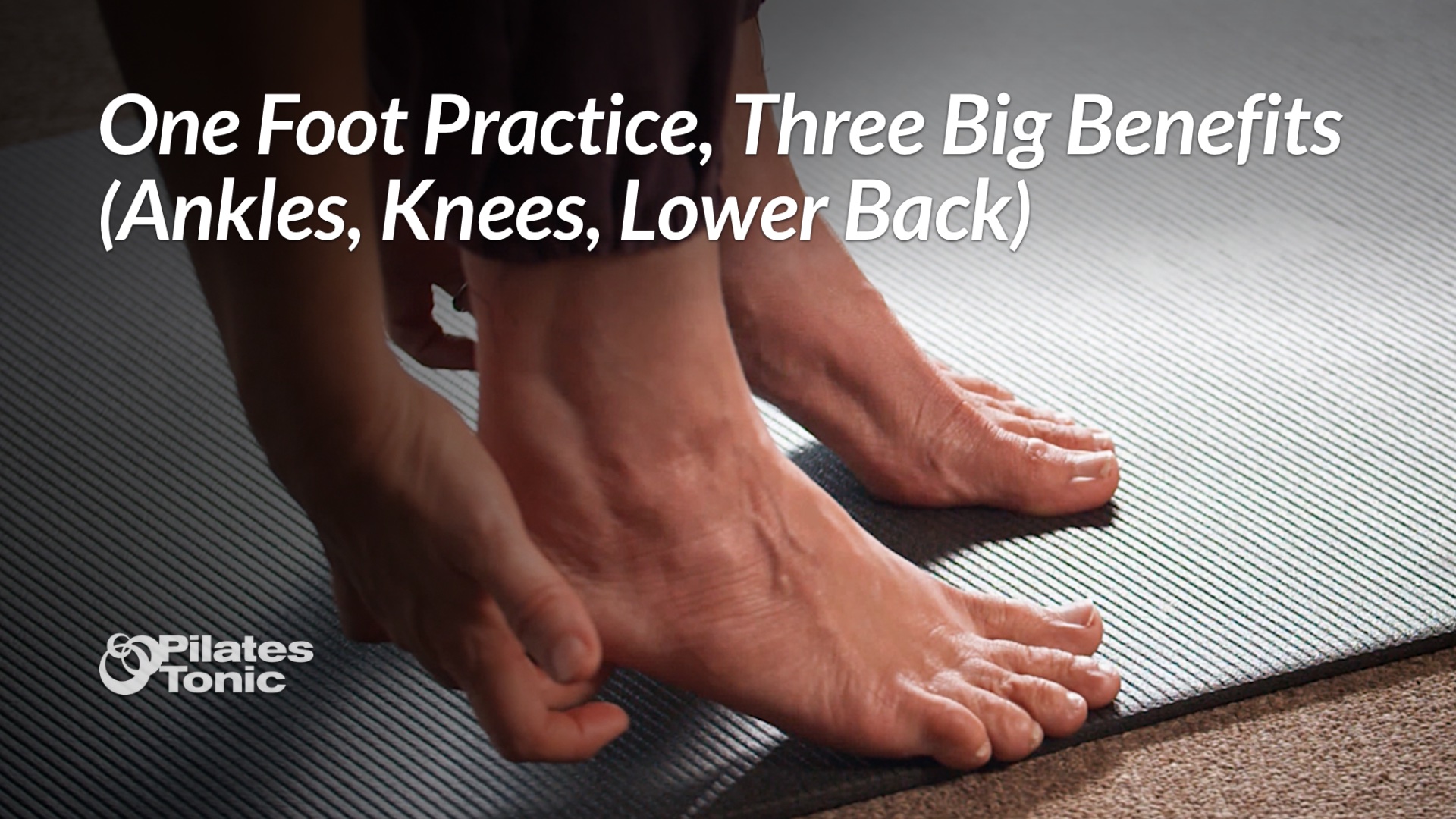 Close-up photograph of bare feet positioned on a textured gray Pilates mat, showing proper foot alignment and toe spread for foot strengthening exercises, with the Pilates Tonic logo visible