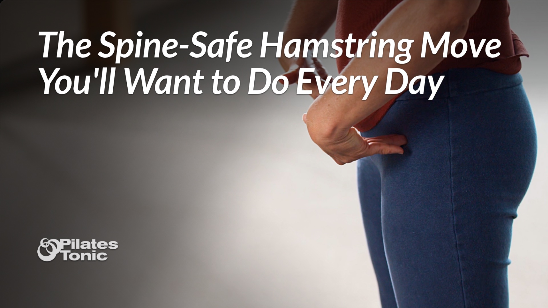 Side view of a woman in blue leggings and a rust-colored top demonstrating a hip hinge, her hands pressing into her upper thighs as she hinges forward at the hips. Text overlay reads "The Spine-Safe Hamstring Move You'll Want to Do Every Day." Pilates Tonic logo in lower left corner.